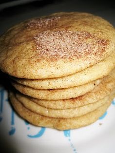 a stack of cookies sitting on top of a white plate