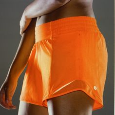 Built-In Liner With Stash Pocket, Zippered Pocket Inseam, Reflective Detail And Drawstring To Cinch Waist In Neon Orange Color - Size 4 Tall Lululemon Athletica, Halloween Ideas, Orange Shorts, Lululemon Shorts, Shorts Athletic, Neon Orange, Cinched Waist, Athletic Shorts, Orange Color