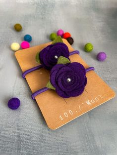 Felt Flower Hair Tie - Style and Comfort for Your Hair Add a special touch to your hairstyle with our charming felt hair tie. Handmade with soft, high-quality felt, this hair tie is not only functional but also adds a stylish flair to any look. Quantity: 2 Features: - Material: 100% wool felt. - Design: Available in a variety of vibrant colors, perfect for matching with your everyday outfit or for special occasions. - Size: Elastic and flexible, it comfortably adapts to any hair type, keeping it Flower Hair Tie, Felt Design, Your Hairstyle, Felt Flower, Ponytail Holder, Tie Styles, Everyday Outfit, Ponytail Holders