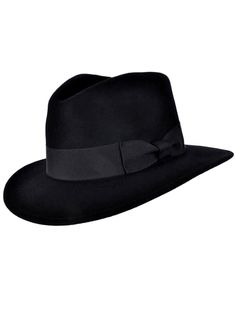 "No 1940s or 50s ensemble is complete without a dashing vintage style fedora. This retro black hat features a wide brim and a deep grosgrain hatband, which is adorned with a ribbon tail to one side. The hat has a deep crown, which provides ample space for your head while also adding to the vintage look and feel of the hat. 100% wool, handmade. Measurements: Small: 55cm circumference Medium: 57cm circumference Large: 59cm circumference X Large: 61cm circumference Brim Width: approx 2.25\" / 7 cm Crown Height: approx 4\" / 10.5cm Sizing note: Please check your head size against these measurements for an accurate fit, although please note like with any manufactured item there may be a very slight variation in size. Your head should measure the same as the hat circumference we state, as there Mens Fedora Hat, 1940s Looks, Black Fedora Hat, Tall Hat, Mens Fedora, Black Fedora, Black Pure, Trilby Hat, Fashion Cap