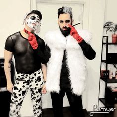 two men dressed up in costumes and makeup