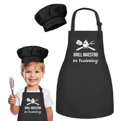 a young boy wearing an apron and chef's hat with the words grillmaster in training on it