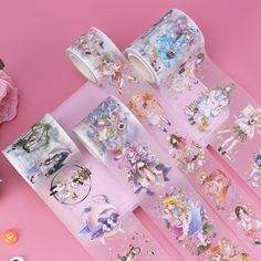 several rolls of washi tape with princesses on them and stars in the background