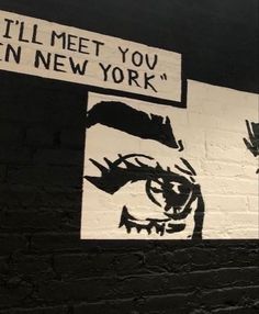 graffiti on the side of a brick wall that says, i'll meet you in new york