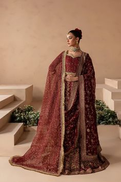 Premium Red Choli Lehenga and Dupatta Pakistani Bridal Dress is a heavily embellished masterpiece adorned with the hand-crafted details of dabka, naqshi, crystals, motifs, and sequins. The perfect stitching and premium quality of fabric make this Red Lehenga Choli an epitome of beauty. Shaadi Ideas, Bridal Lehenga Pakistani, Pakistani Bridal Lehenga, Red Lehenga Choli, Pakistani Bridal Dress, Lehenga Bridal, Red Bridal Dress, Lehenga Dupatta, Resham Work