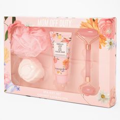 Give mom the perfect set for a spa day! This Mom Off Duty set includes a soft pink bath pouf, a rose-shaped bath bomb, rose-scented hand lotion, and a roller. Treat her like a queen on Mother's Day. Includes: Bath pouf, bath bomb, hand lotion, jade roller Material: Cream - Claire's Mom Off Duty Spa Gift Set Treat Her Like A Queen, Spa Gift Set, Pink Baths, Xmas 2024, Spa Set, Jade Roller, Spa Gifts Set, Angel Tree, Spa Gift