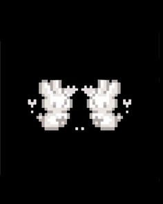 two white objects are in the middle of a black background, one is pixeled