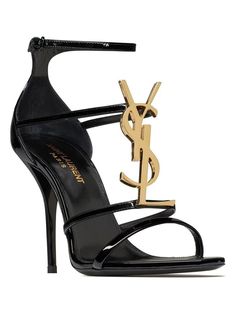 Step out in style with these stunning open-toe sandals crafted from black, calf leather by Saint Laurent. The gold-tone logo plaque adds a touch of luxury, while the high heel and buckle-fastening ankle strap offer both elegance and comfort. Black, calf leather construction Gold-tone logo plaque Open toe High heel for added style Buckle-fastening ankle strap for a secure fit Makeup Images, Leather Heels Sandals, Patent Leather Heels, Muslimah Fashion, Girl Shoes, Open Toe Sandals, Dream Board, Toe Sandals, Sneaker Heels