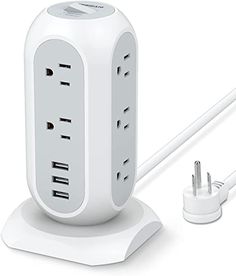 an electronic device with multiple plugs attached to the charger and charging cord, on a white background