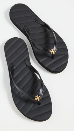 Fabric: Rubber Gold-tone logo emblem at straps Embossed footbed Open toe Rubber sole Imported, Brazil This item cannot be gift-boxed Soft Sandals, Tory Burch Kira, Black Flip Flops, Tory Burch Sandals, Logo Emblem, Tory Burch Miller, Mule Sandals, Dream Shoes, Tory Burch Shoes