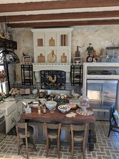 an old fashioned kitchen is decorated in white and brown