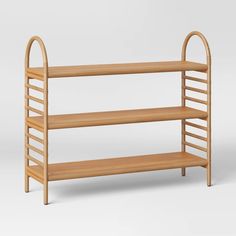 a wooden shelf with three shelves on each side