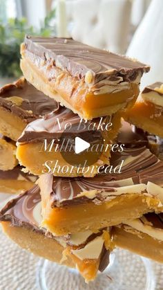 chocolate and peanut butter shortbreads stacked on top of each other in a glass dish