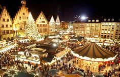 an aerial view of a christmas market in europe