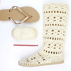 a crocheted boot, sandals and knitting needles