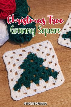 two crocheted christmas tree granny square on a table