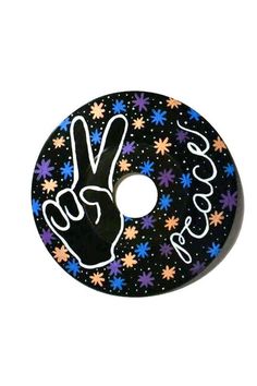 a peace sign painted on top of a black and blue flowered disc with the word peace written in white