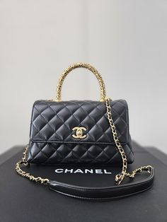 Beautiful, Rare Chanel Coco Handle Bag in Excellent/Like-New Pre-owned Condition! • Chanel Top Handle Bag • From the Fall 2022 Collection • Black Quilted Leather • Interlocking CC Logo • Gold-Tone Hardware • Rolled Handle & Detachable Chain-Link Shoulder Strap • Single Exterior Pocket • Leather Red Lining • Turn-Lock & Flap Closures at Front • Folded original box, original dust bag, 2 camellias and chanel ties included) Chanel Top Handle Bag, Chanel Top Handle, Chanel Coco Handle, Chanel Top, Coco Handle, Chanel Purse, Fall 2022, Black Quilt, Cc Logo