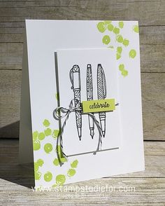 a close up of a card with scissors on it