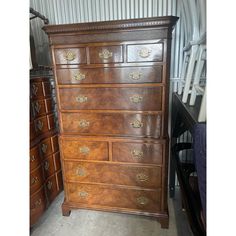 an old wooden dresser with many drawers