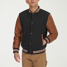 Elevate your look with the Levi's Men's Mixed Media Bomber Jacket, crafted with a stylish blend of wool and sleek faux leather. Designed with a banded hemline, neckline, and cuffs for a tailored fit, it features a full zipper and snap closure for versatile wear, along with two side slip pockets for everyday convenience. Don't miss out on this must-have piece to upgrade your wardrobe.Features: Elastic BottomClosure Type: Snap & ZipperNeckline: Collar NeckPockets: 2 Side Slip Pockets, 1 Inside Cel Bomber Jackets, Levis Men, Snap Closure, Mixed Media, Bomber Jacket, Coats Jackets, Faux Leather, Wool, Christmas