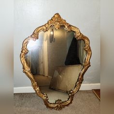 a mirror that is sitting on the floor