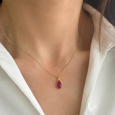 Tiny Ruby Necklace with a Genuine Ruby Pendant! This Ruby Gemstone Necklace is a July Birthstone Necklace! ✔️Genuine Red Ruby Necklace✔️ High-Quality  925 Sterling Silver ✔️ 24K Gold  Finish✔️ This Real Ruby necklace is great for wearing alone or for layering with other necklaces. It is the perfect gift for your girlfriend, sister, bridesmaids, or even yourself! Made by hand in Greece.   Moreover, RUBY is a really powerful crystal that promotes self-confidence and good fortune 👉A few words about Genuine Red Ruby . Rubies are thought to guarantee good health, wealth, wisdom, and success in love. Ruby is a symbol of good fortune, pure love, and loyalty.  As an aphrodisiac stone, it brings vigor into your life. It brings harmony and deep inner self-knowledge.     >>Chain SIZE Available optio Ruby Teardrop Pendant Necklace, Gemstone Teardrop Pendant Drop Necklace, Red Teardrop Gemstone Drop Necklace, Red Teardrop Gemstone Necklace, Red Gemstone Drop Necklace For Gift, Ruby Drop Necklace For Gift, Drop Gemstone Crystal Necklace, Real Ruby Necklace, Red Ruby Necklace