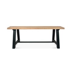 a wooden table with black legs and a white background