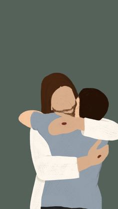 two people hugging each other with one holding the other's arm around his neck