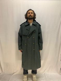 "Yorn Dark Blue with Warm inner lining Type: Vintage Trench coat, solid for bad weather, classic timeless look. Cotton Size: 52/L Shoulders: 54 Sleeves: 62 Chest: 65 Length: 130 Style: The Classic Reinvented There are so many ways to wear a classic vintage Trench coat  Here are some tips about it : \"1. Mix the prints - Trenches are a super classic piece, so don't be afraid to mix prints.  2. Jeans!  this works best with a more fitted blazer style and loose mom jeans) or give the masculine style a bit of femme with a colourful neck scarf or layer some fun, gold necklaces. 3. Casual Juxtaposition - No longer reserved for the business professional, the Trench looks especially cool paired with your favourite casual gear. Try layering yours over a hoodie, or paired with your comfiest sneakers Casual Fitted Raincoat For Winter, Winter Long Fitted Raincoat, Classic Long Sleeve Raincoat For Outdoor, Solid Winter Raincoat For Cold Weather, Winter Raincoat For Cold Weather, Classic Winter Parka With Pockets, Military Style Winter Workwear Parka, Classic Outerwear For Outdoor, Military Style Winter Parka For Work