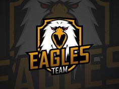 an eagle logo with the words eagles team on it's chest and two red eyes