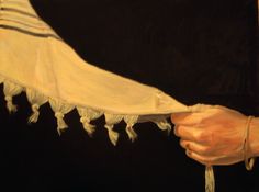 a painting of a woman's hand holding a white cloth with tassels