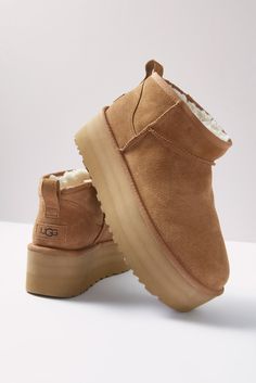 These classic UGG® boots reach new heights with a bold platform sole. The Ultra Mini is crafted for ultimate coziness with soft suede and plush wool-blend lining. | UGG Women's Ultra Mini Platform Shoes, Size 8, Brown Uggs Ultra Mini, Ultra Mini Uggs, Cute Uggs, Ugg Ultra Mini, Dr Shoes, Classic Ugg Boots, Ugg Classic Ultra Mini, Ugg Mini, Sheepskin Boots