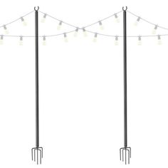 three black poles with lights on them and one pole has two forks attached to it