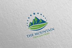 the mountain logo is shown on a white paper with blue and green mountains in the background