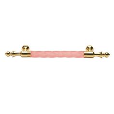 a pink cord with gold fittings and two brass handles on a white background photo