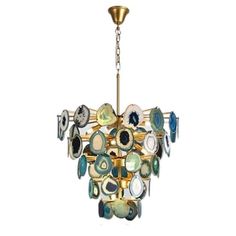 a chandelier with many different colored glass pieces hanging from it's ceiling