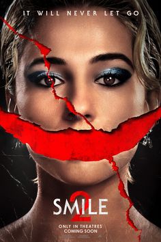 a poster for the movie smile with a woman's face torn apart from it