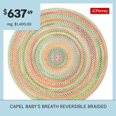 a circular rug with the words capel baby's breath revise braided on it