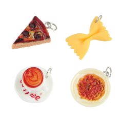 four pieces of food are shown in the shape of keychain charms and pendants