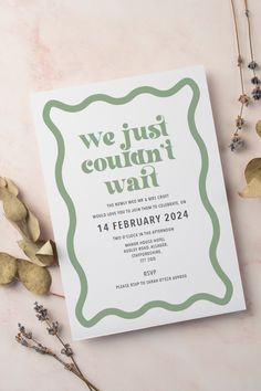 a white and green wedding card with the words we just couldn't wait on it