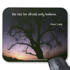 a computer mouse pad with a tree and the words do not be afraid, only believe