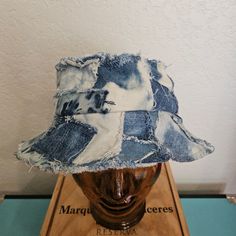 One of a kind denim bucket hat made with recycled denim jeans.  Every hat is unique.  Already machine washed and dryed for optimal distressed look.  Very comfortable on.   Ready to ship Medium Wash Denim Bucket Hat For The Beach, Medium Wash Denim Bucket Hat With Wide Brim, Medium Wash Denim Bucket Hat For Beach, Distressed Brimmed Cotton Hat, Distressed Cotton Hat In Medium Wash, Distressed Cotton Brimmed Hat, Denim Bucket Hat In Medium Wash, Vintage Denim Hat In Medium Wash, Medium Wash Denim Bucket Hat