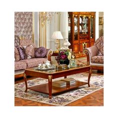 a living room with two couches and a coffee table in front of a china cabinet