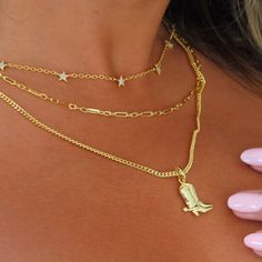 Saddle up in style with our Giddy Up Necklace! Featuring a charming cowboy boot pendant and a dazzling hand-set Cz stone, this necklace is perfect for any cowgirl looking to add some flair to their outfit. Giddy Up, Cowgirl Look, Cow Girl, Cowboy Boot, Cz Stone, Silver Necklaces, Cowboy Boots, In Style, Saddle