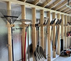 a room filled with lots of different types of utensils hanging on the wall