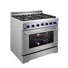 an oven with four burners and one door open on a white background is shown