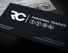 two business cards with the words personal trainer on one side and an arrow symbol on the other