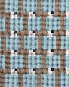 a blue and brown checkerboard pattern on fabric