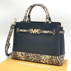 Brand New With Tag Michael Kors Reed Large Center Zip Satchel Crossbody Bag Details Color: Nat/Black Snakeskin Leather Satchel Logo-Print Canvas 89.4% Coated Canvas/9.6% Polyester /1% Polyurethane Trim: 60% Polyurethane/20% Cotton/20% Polyester Gold-Tone Hardware 13.25 W X 9.25"H X 5.25 D Handle Drop: 4" Adjustable Strap: 18.5"-22.25" Interior Details: Back Zip Pocket, Front Slip Pocket Lining: 100% Polyester Zip Fastening Dust Bag Not Included Imported Bag Details, Michael Kors Black, Leather Satchel, Interior Details, Logo Print, Zip Pockets, Adjustable Straps, Crossbody Bag, Satchel